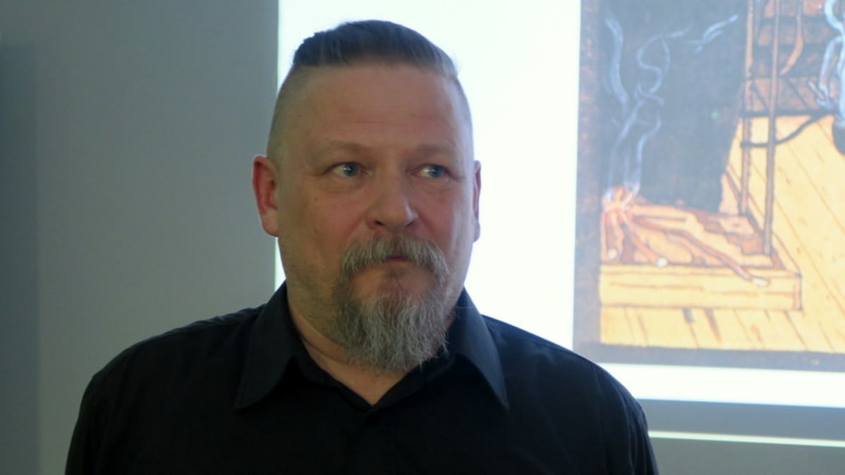 Mies kuvassa