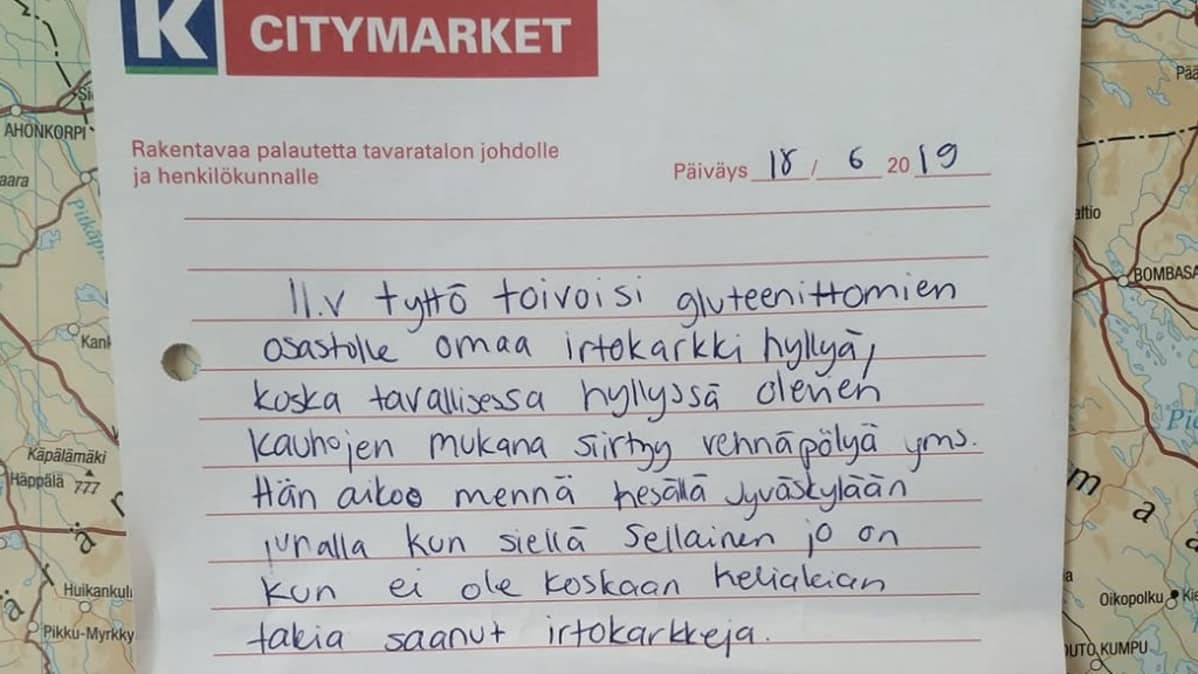Palautelappu kaupan seinällä