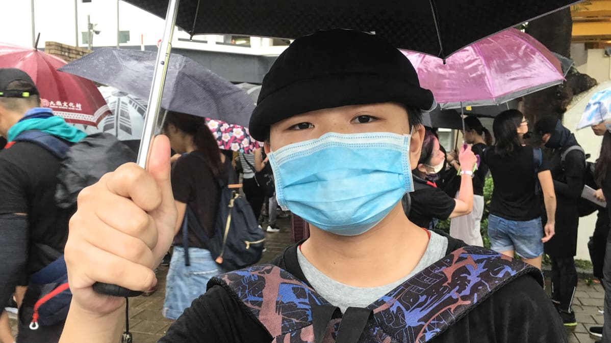 Mielenosoittaminen on velvollisuuteni, koska olen hongkongilainen, sanoo 16-vuotias Cheung Wai Yan.