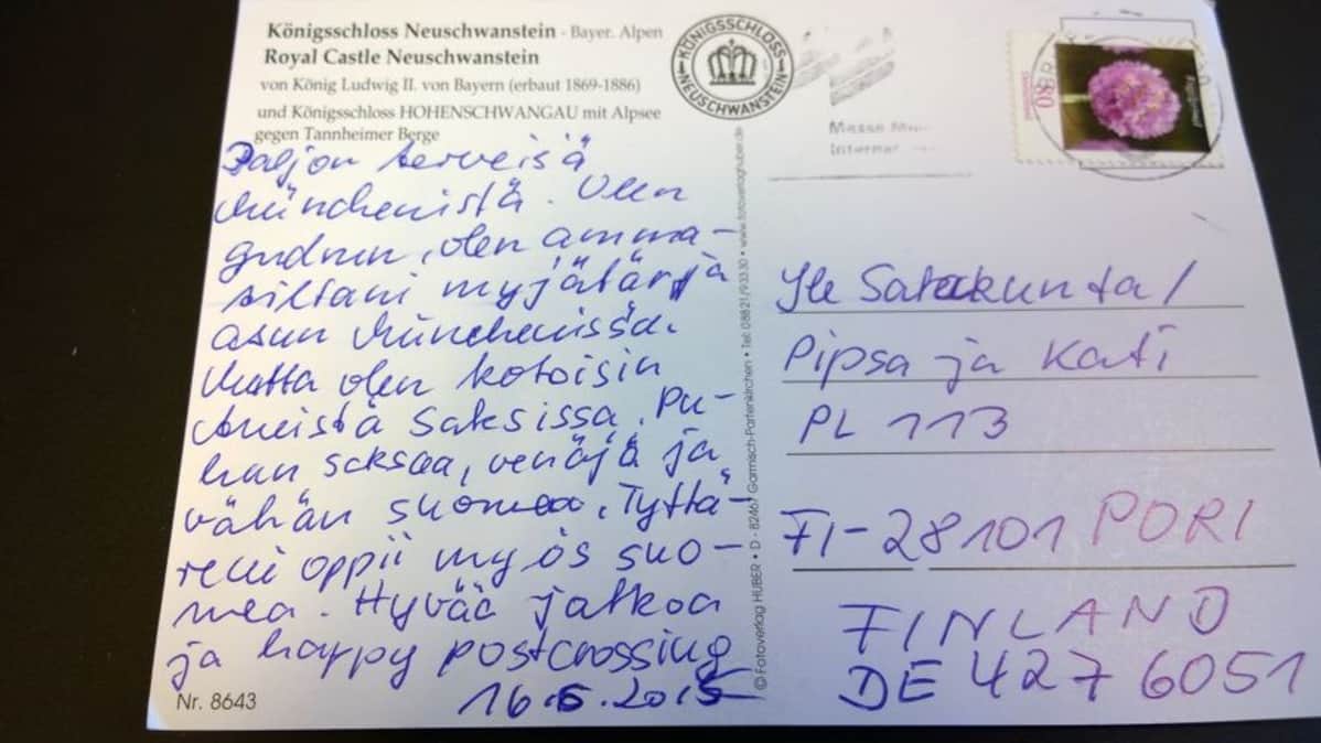Postikortin takapuoli, jossa tekstiä