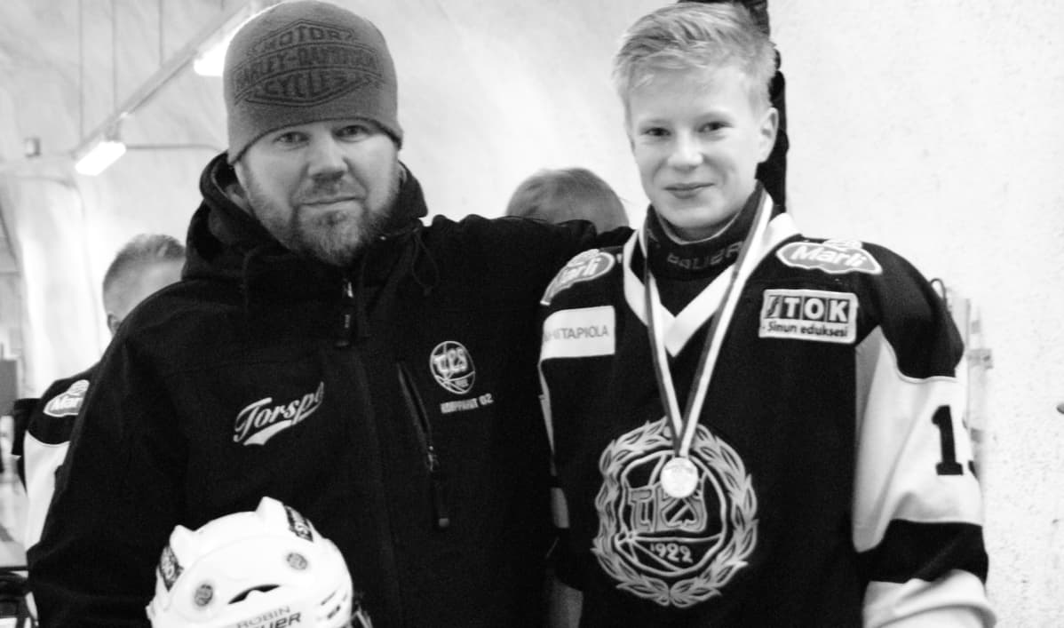 Ari Heinonen poikansa Robinin kanssa