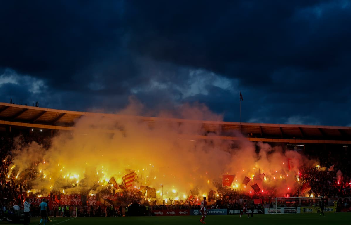 MAY 23: Crvena Zvezda fans light torches during the Serbian Cup Final match between FK Crvena Zvezda and FK Partizan at stadium Rajko Mitic on May 23, 2019 in Belgrade, Serbia