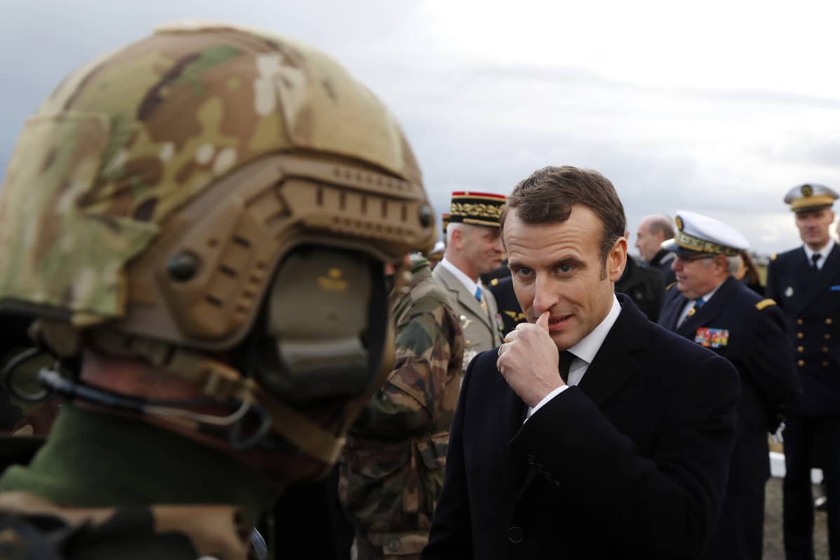 French President Emmanuel Macron meets with paratroopers of the 11th Brigade of the Paratroopers of the Infantry before he delivers his 2019 new year wishes to military forces at Toulouse-Francazal air base near Toulouse, southern France, 17 January 2019. EPA-EFE/GUILLAUME HORCAJUELO