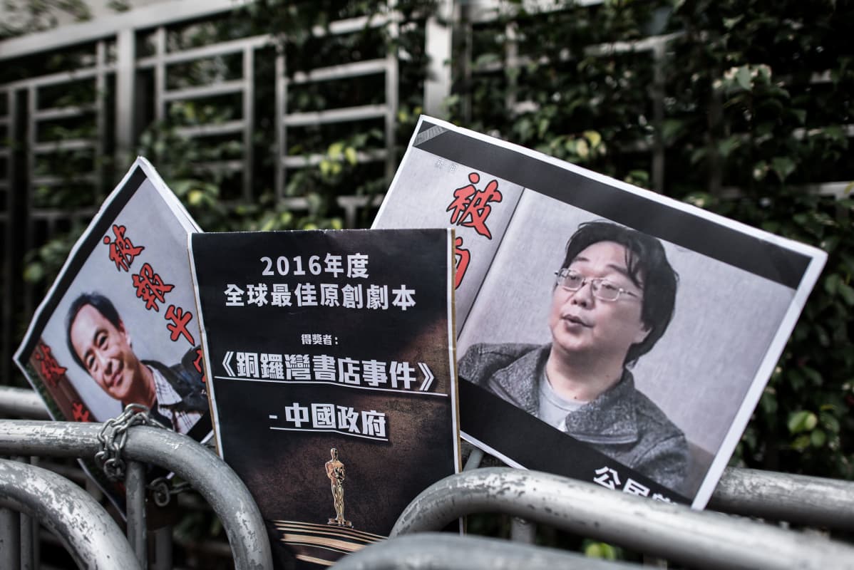 Kirjakauppiaat Lee Bo ja Gui Minhai kuvissa Hongkongissa.