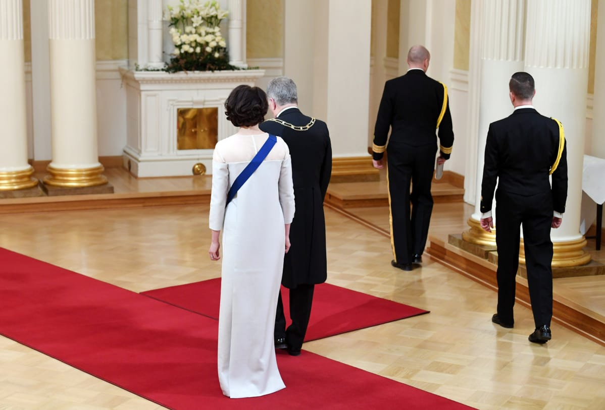 Tasavallan presidentti Sauli Niinistö ja rouva Jenni Haukio itsenäisyyspäivän vastaanottolla Preisdentinlinnassa Helsingissä.
