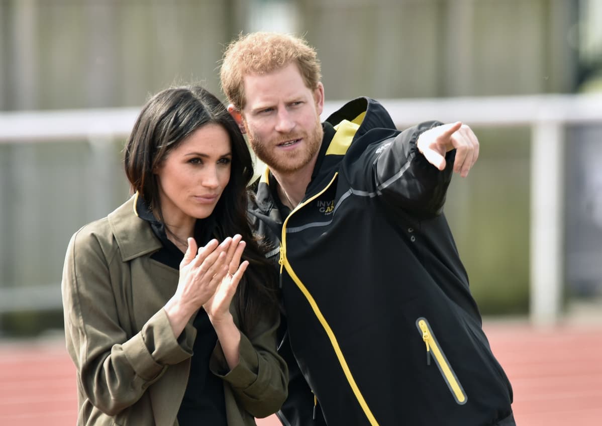 Prinssi Harry ja Meghan Markle edustustilaisuudessa.