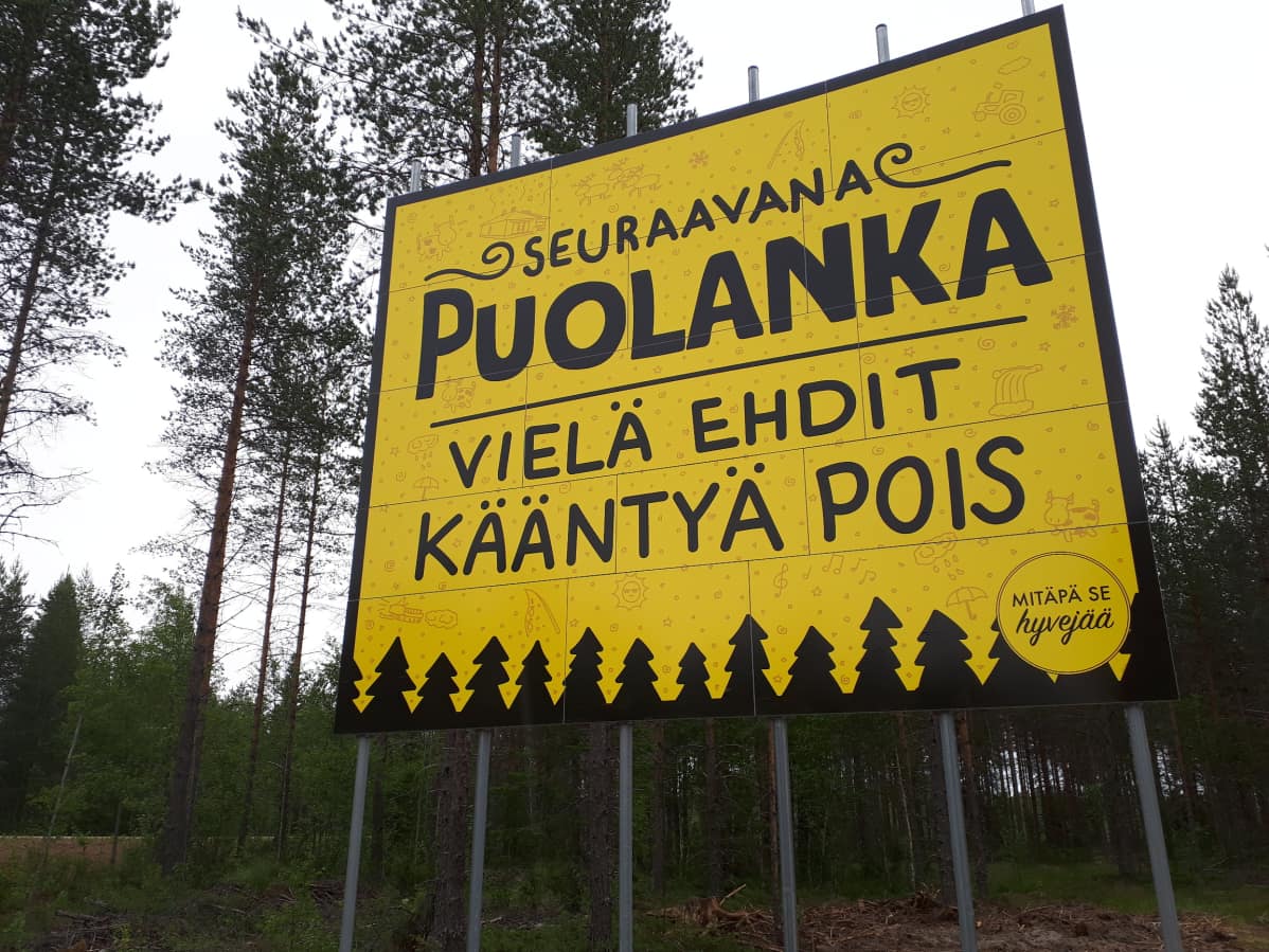 Puolanka tervetuloa kuntaan -kyltti.