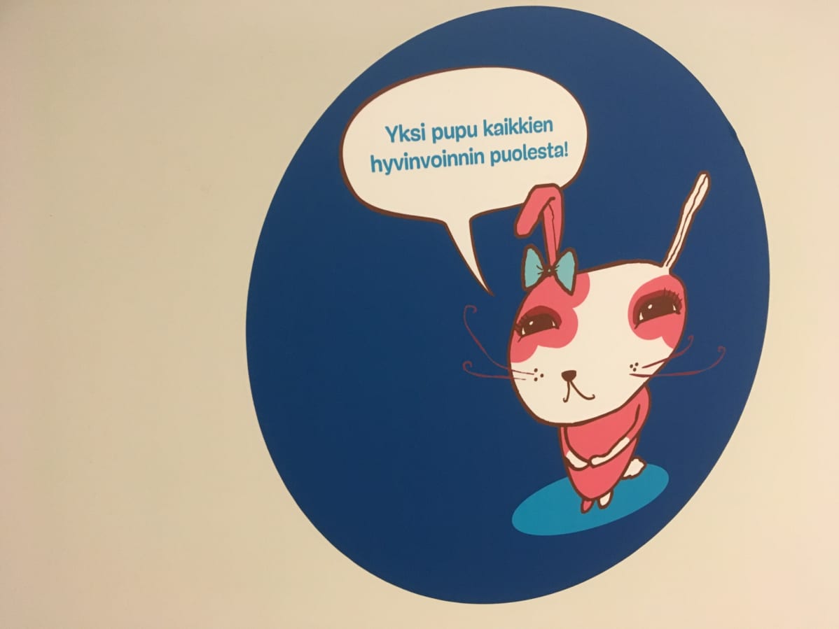 piirretty pupu julisteessa