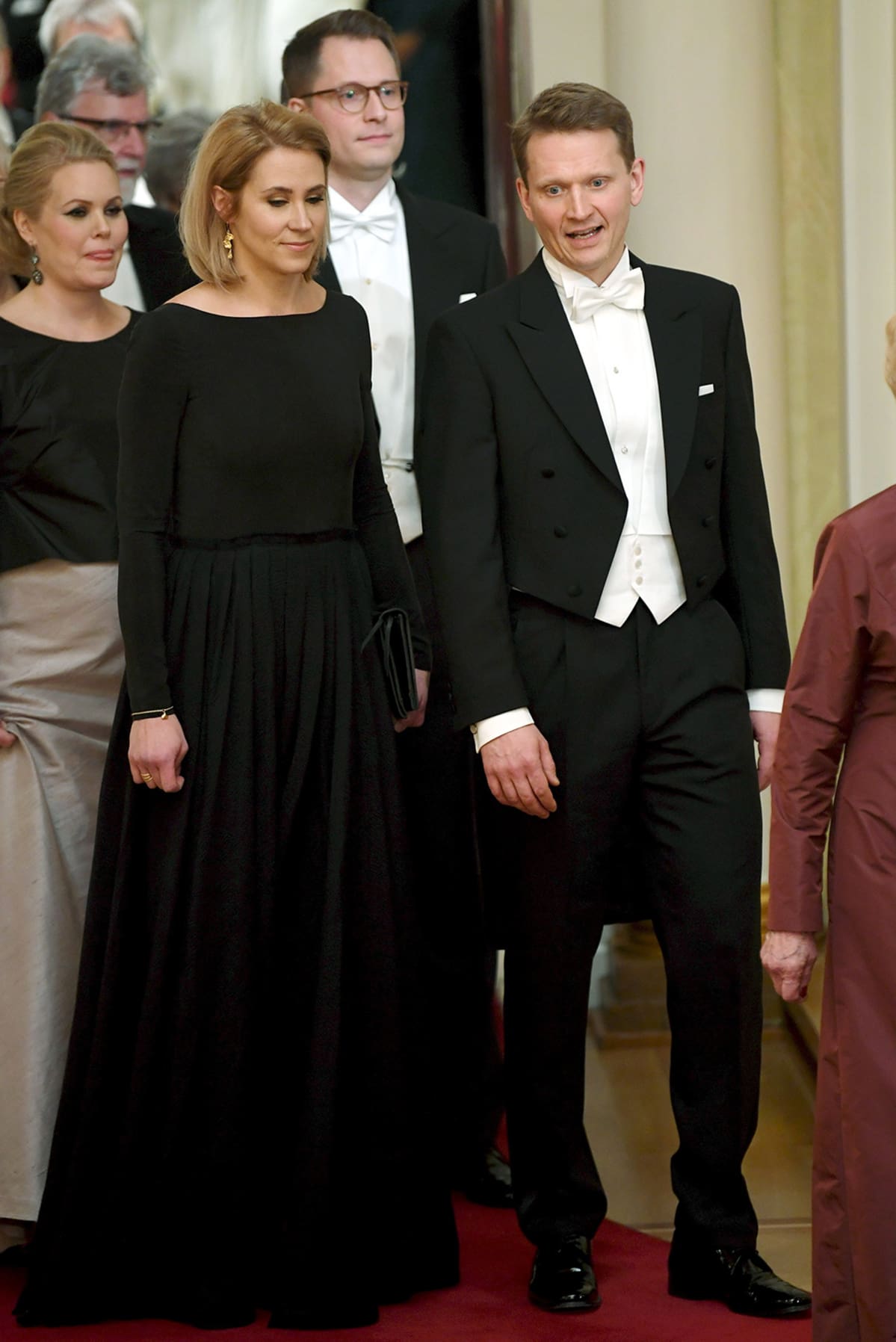 Nuutti ja Saara Niinistö perässään Matias Niinistö ja Liisa Kajaste.