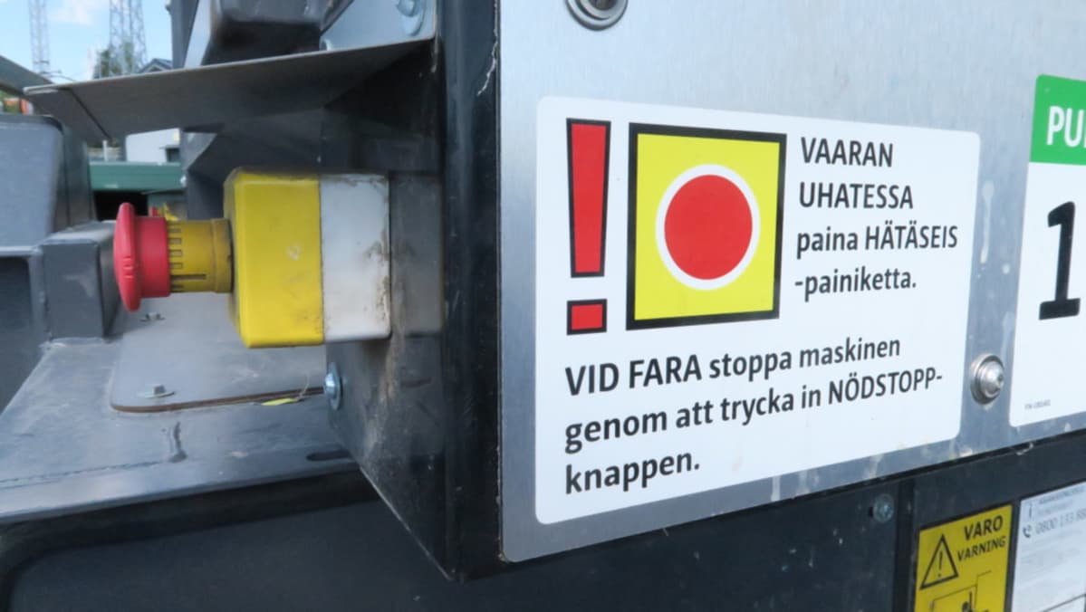 Hätäseis-painike kartonkikeräyspuristimessa