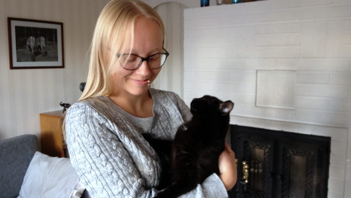 Ilona Olli ja musta kissa