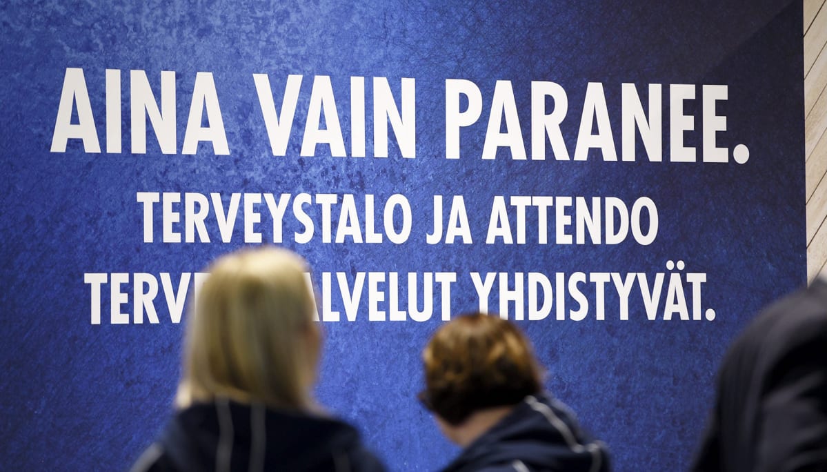 Terveystalon ja Attendo Terveyspalveluiden yrityskauppaa mainostava juliste Lääkäri 2019 -tapahtuman mediakierroksella Messukeskuksessa Helsingissä keskiviikkona 8. tammikutua 2019.