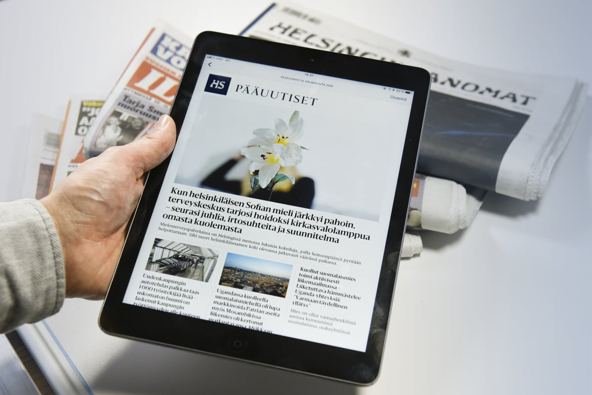Ipad ja sanomalehtiä
