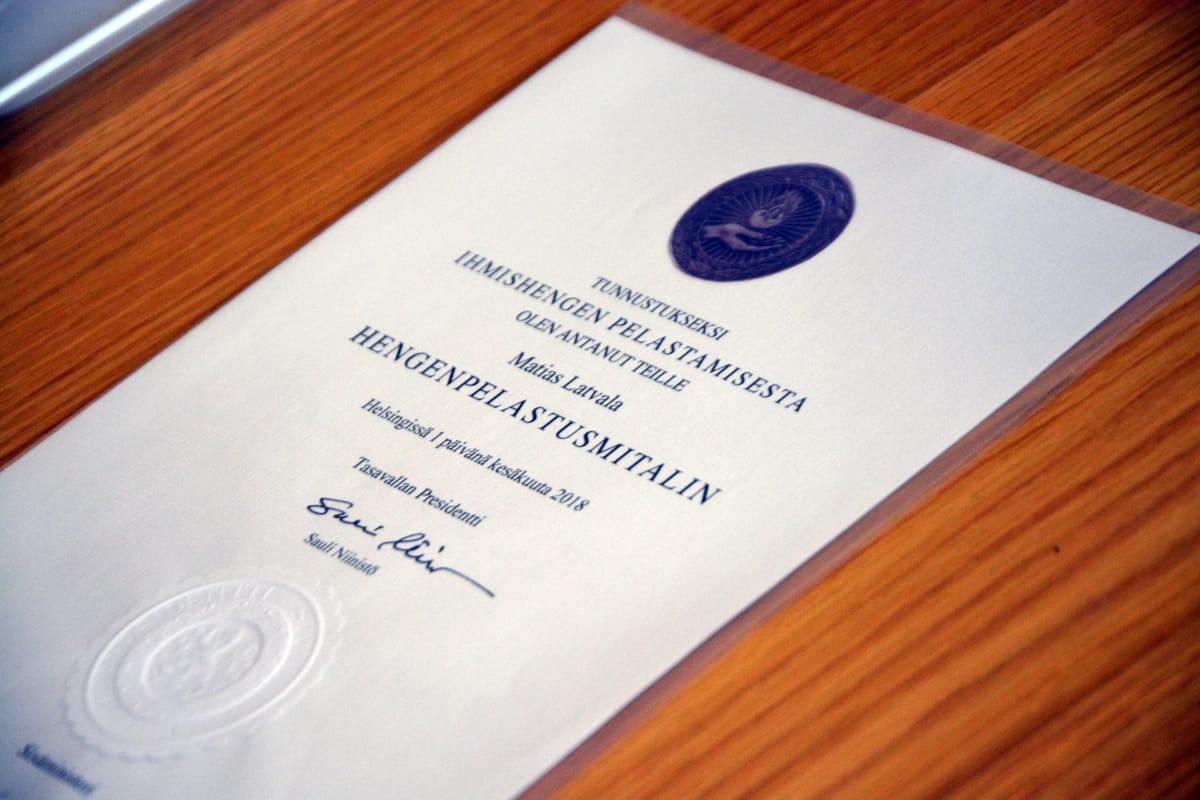 Tasavallan Presidentin myöntämä kunniakirja ihmishengen pelastamisesta