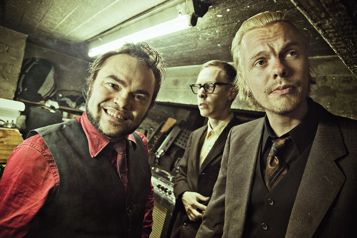 Knucklebone Oscar (kitara), Yukka White (rummut&laulu) ja R.K. Hillside (koskettimet)