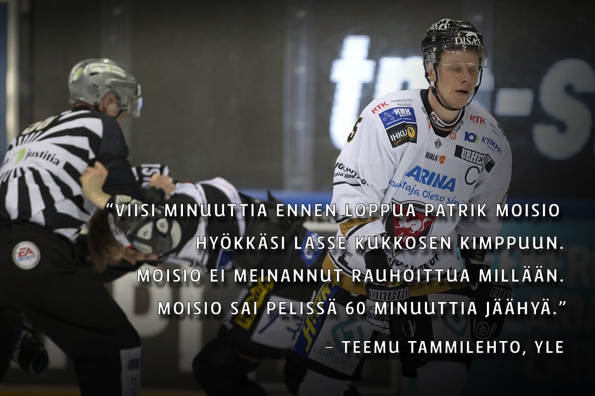 Patrik Moisio painii tuomarin kanssa.