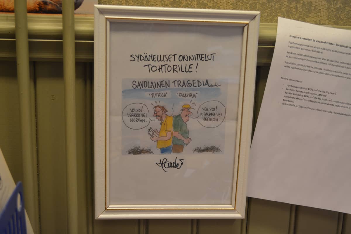 Sipilän pilapiirtäjäkaverin näkemys norppatutkijan työstä.