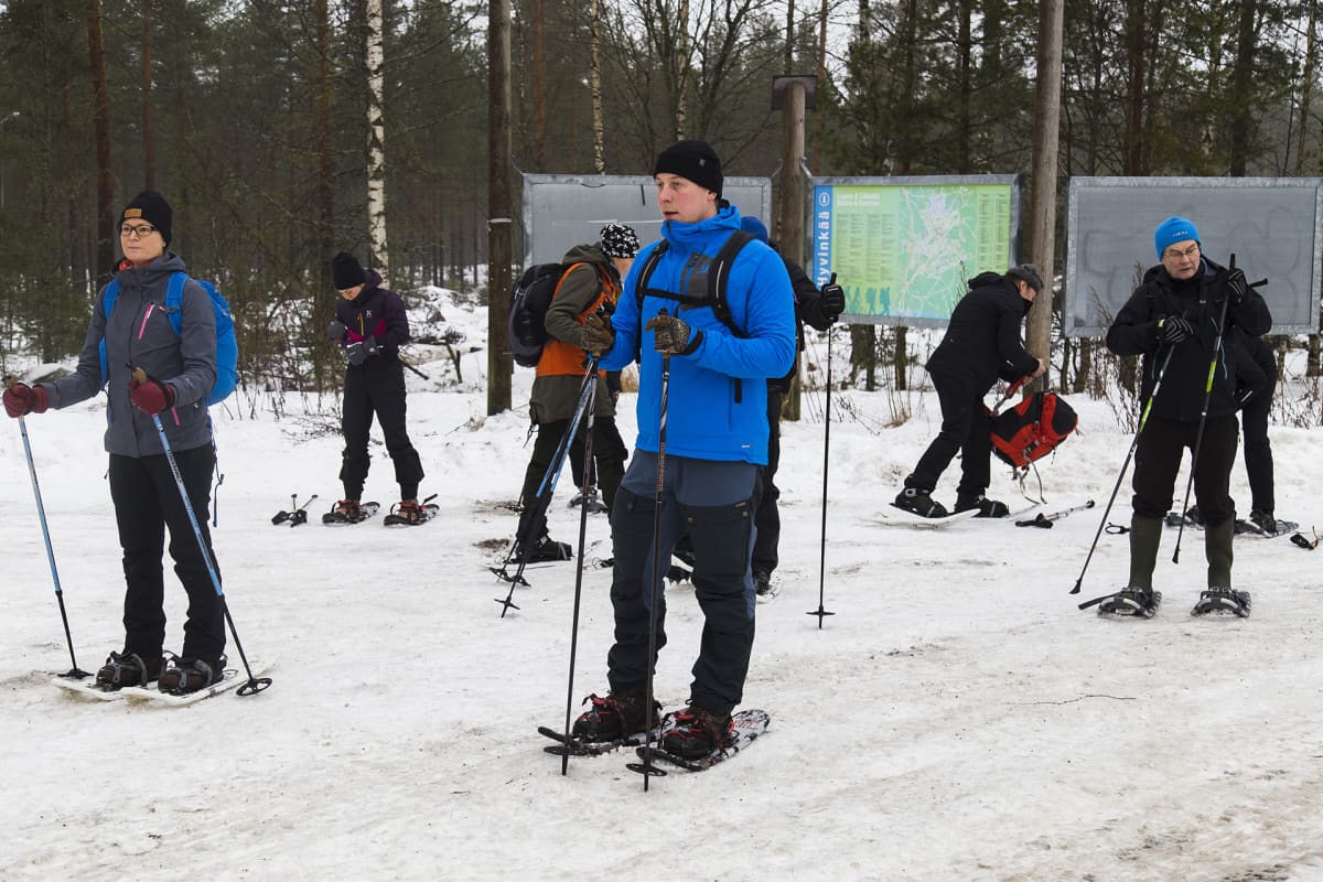 Eräoppaat Jani Heinonen keskellä.