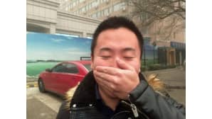 Pekingiläiset suojautuvat savusumulta hengitysmaskien avulla.