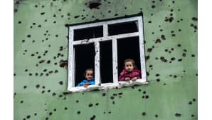 Turkin armeijan ja kapinallisten välisessä taistelussa vaurioitunut rakennus Silopin kylässä, Kaakkois-Turkissa, 19. tammikuuta.