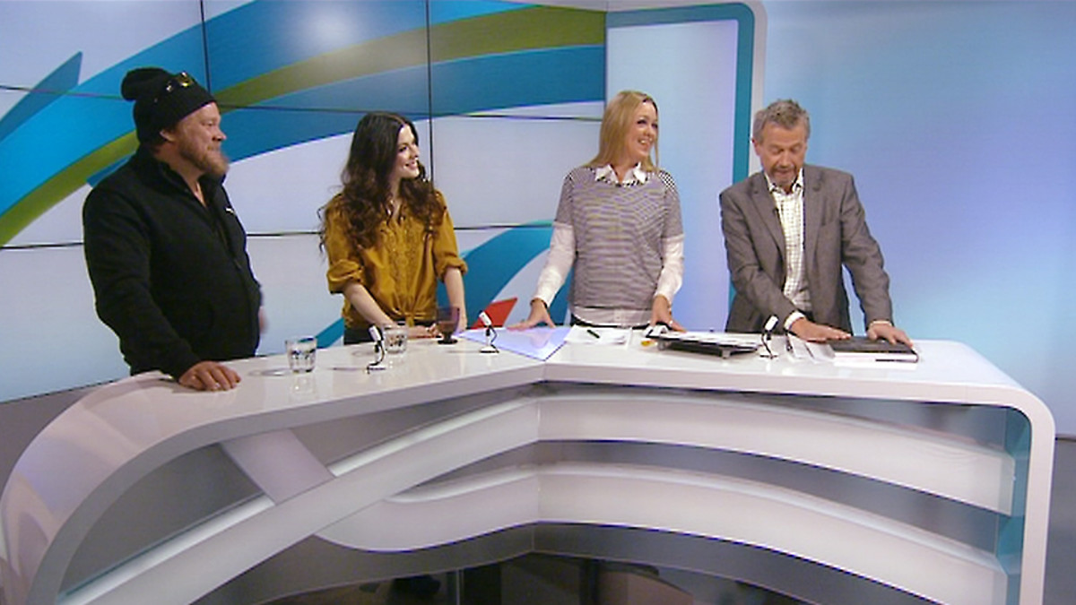 Ville Haapasalo ja Jenni Vartiainen joutuivat uutisstudioon haastateltaviksi.