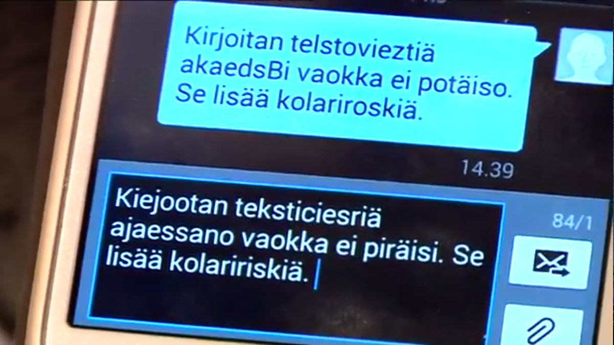 Tekstiviesti puhelimen ruudulla.