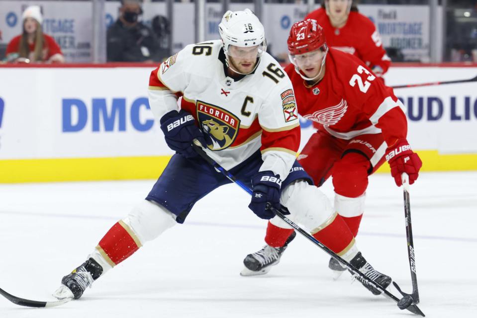 Aleksander Barkov och Lucas Raymond.