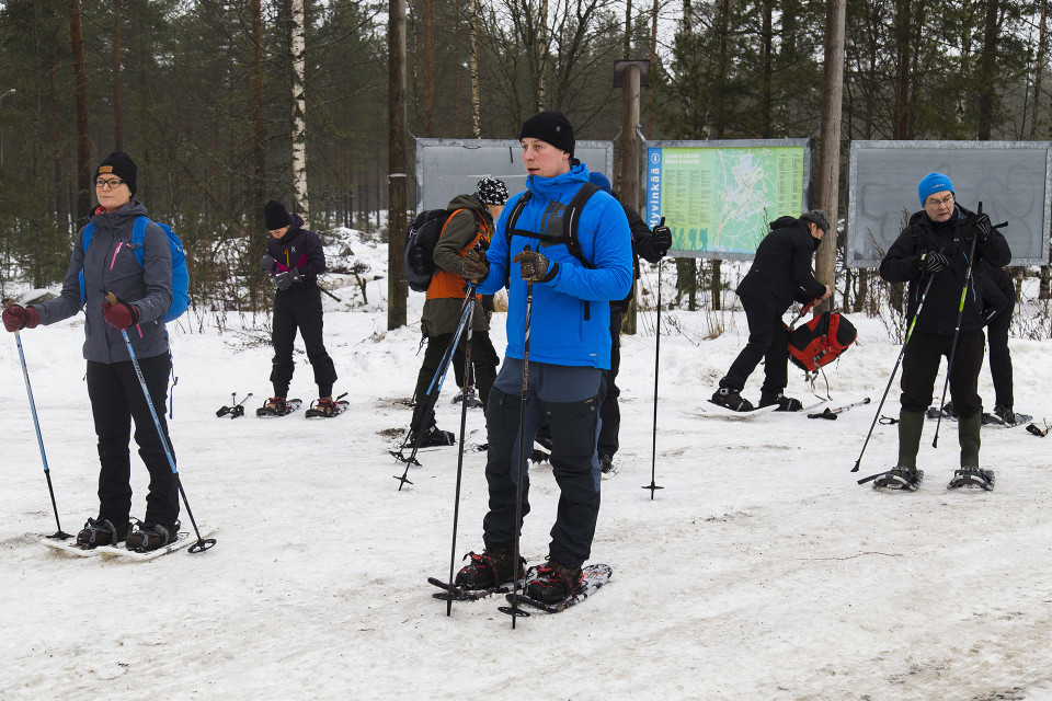 Eräoppaat Jani Heinonen keskellä.