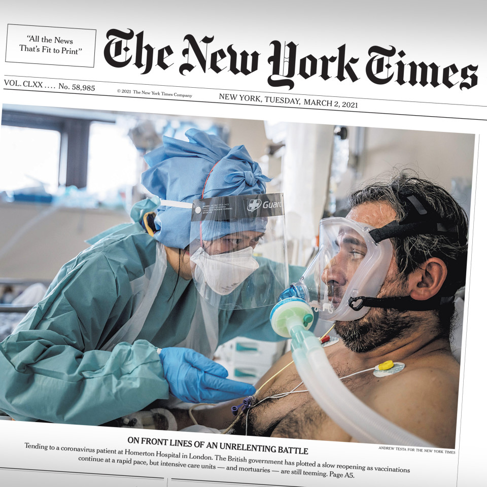 New York Times cover photo with a coronary patient in hospital next to a nurse.