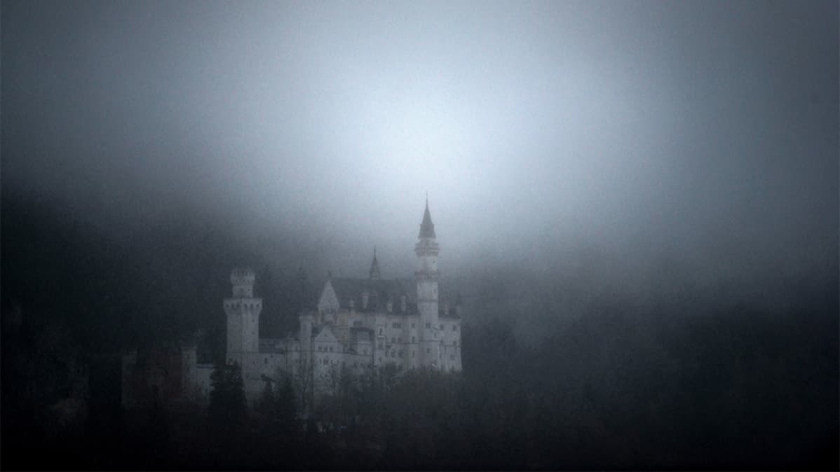 Falling sleet turns famous Bavarian landmark the Neuschwanstein castle near Hohenschwangau, Germany, 25 December 2014 into an almost graytone atmosphere.