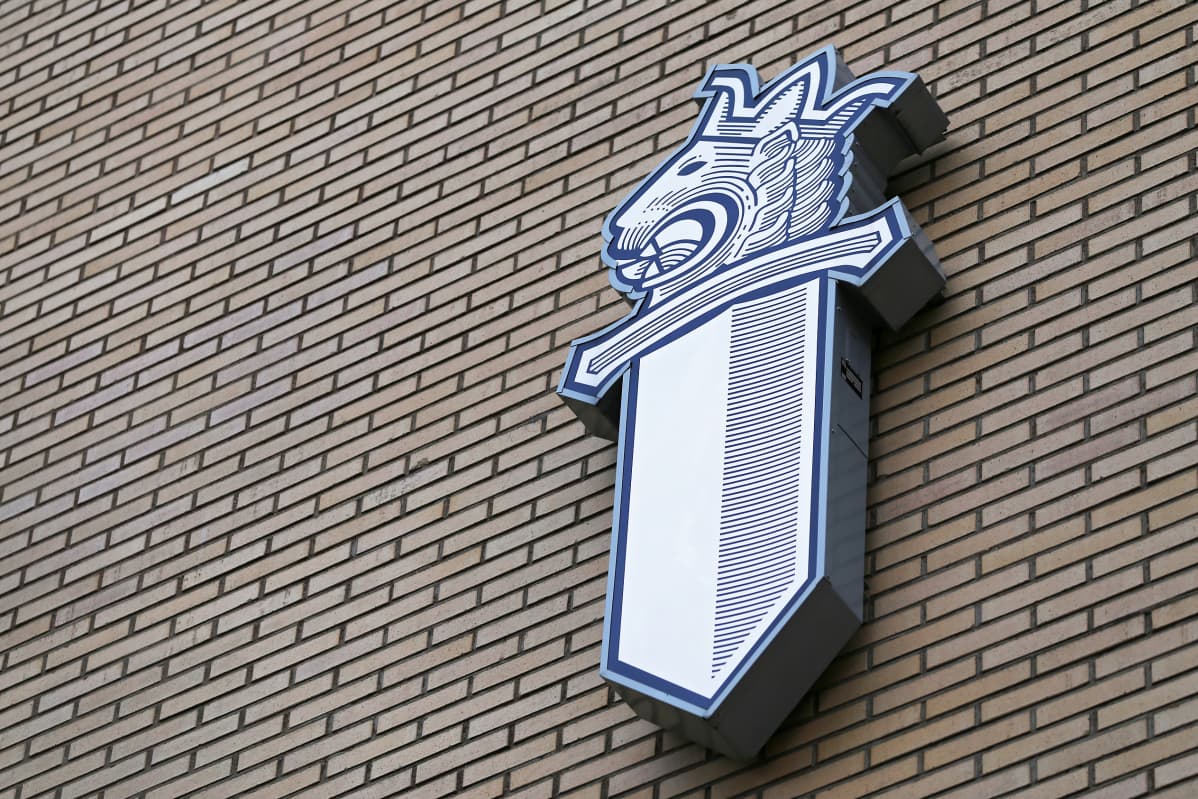 Police logo on the wall of the Turku Police Department.