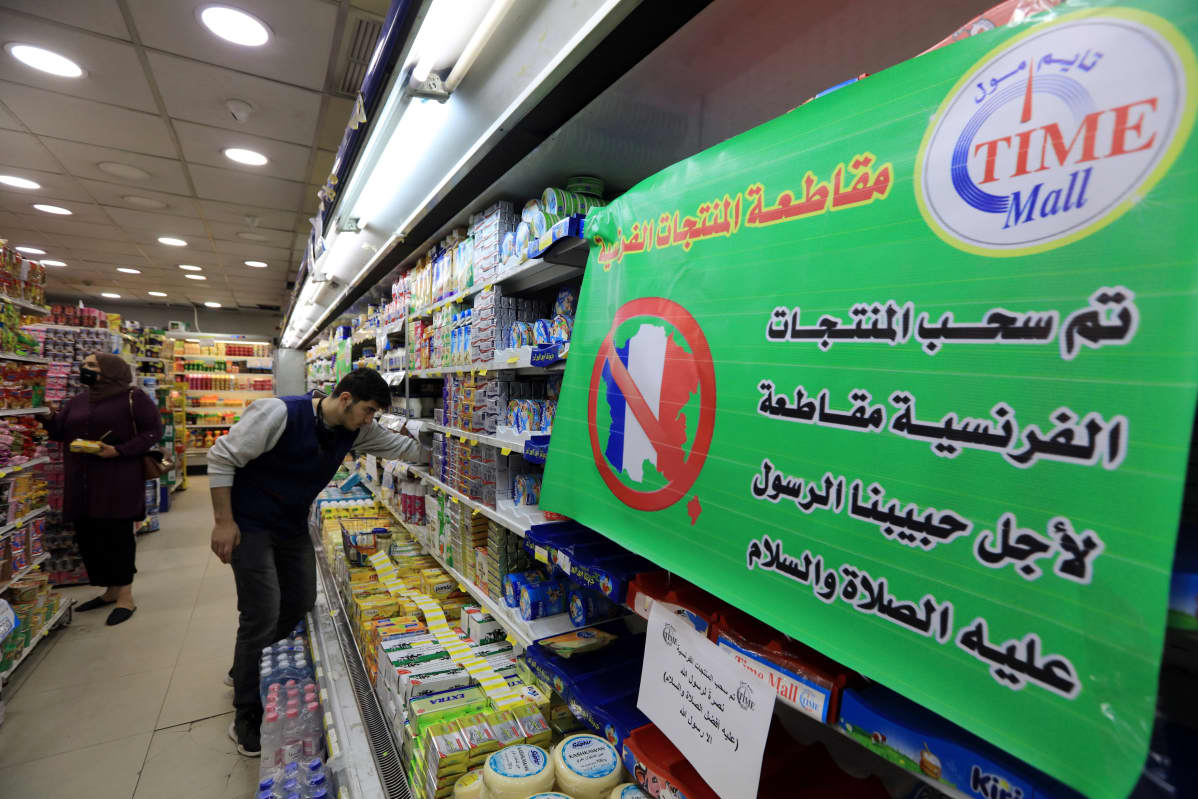 A spot of French products is covered with a placard reading in Arabic 'French products are being boycotted for the sake of the Prophet Muhammad peace upon him', in a supermarket in Amman, Jordan, 26 October 2020. Many people in Jordan called on social media for the boycott of French products as a show of support for Muslims Prophet Muhammad two day before the celebration of the Prophet birthday Mawlid Nabawi on 29 October. The protest call comes amid rising tension in response to French President Macron’s comments following the recent beheading of a teacher in France after he had shown cartoons of the Prophet Muhammad in class. Macron vowed his country would not give up publishing such cartoons EPA-EFE/STR
↑