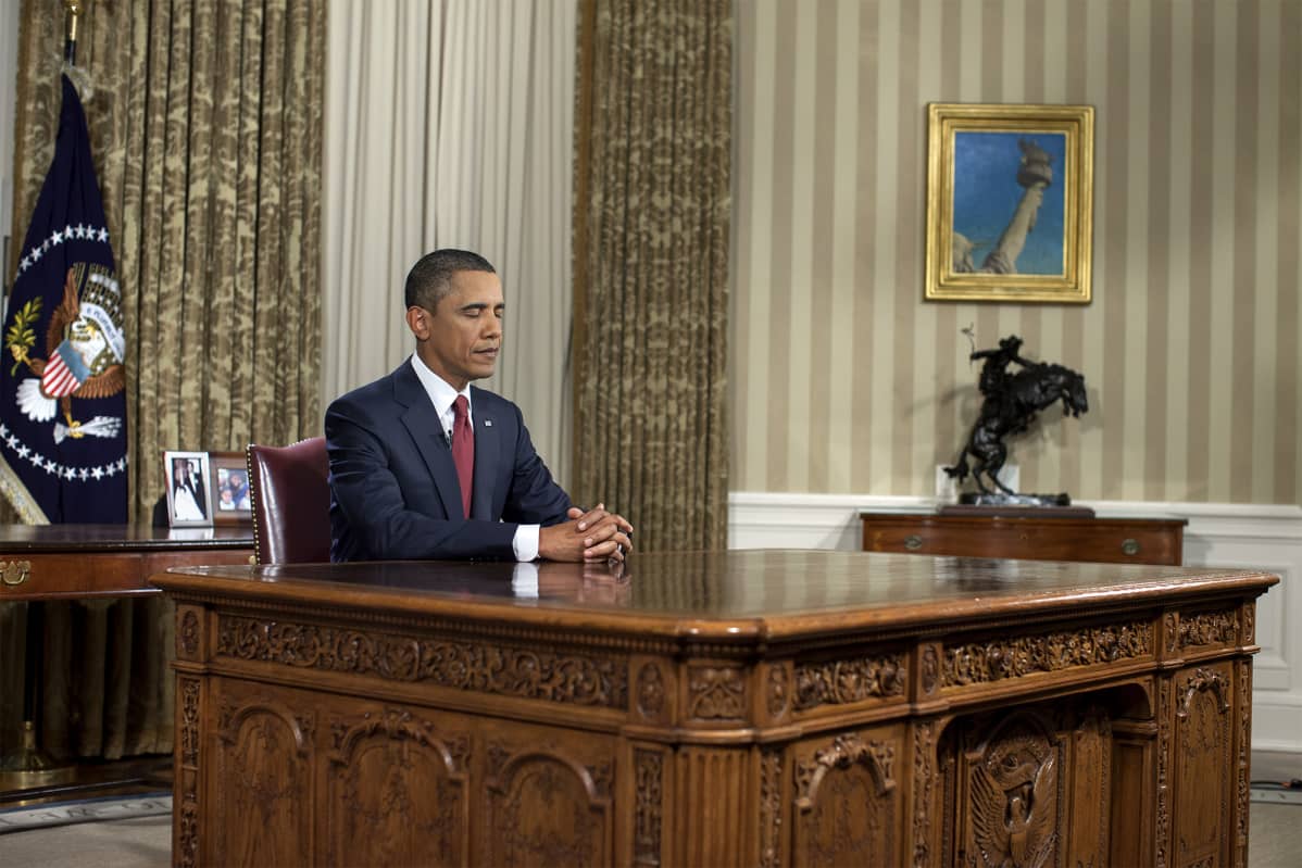 Barack Obama valmistautuu lehdistötilaisuuteen 2010.