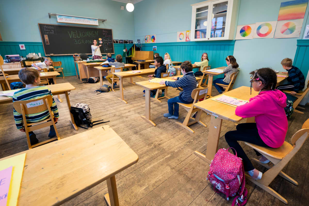 Oppilaita luokassa.
