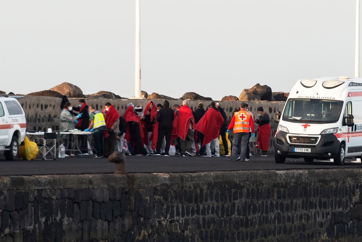 Siirtolaisia Arrecifen satamassa Kanariansaarten Lanzarotella.