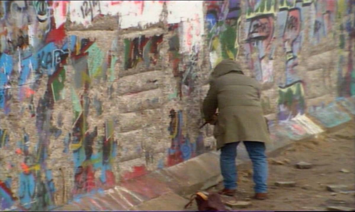 Graffiteja Berliinin muurissa.