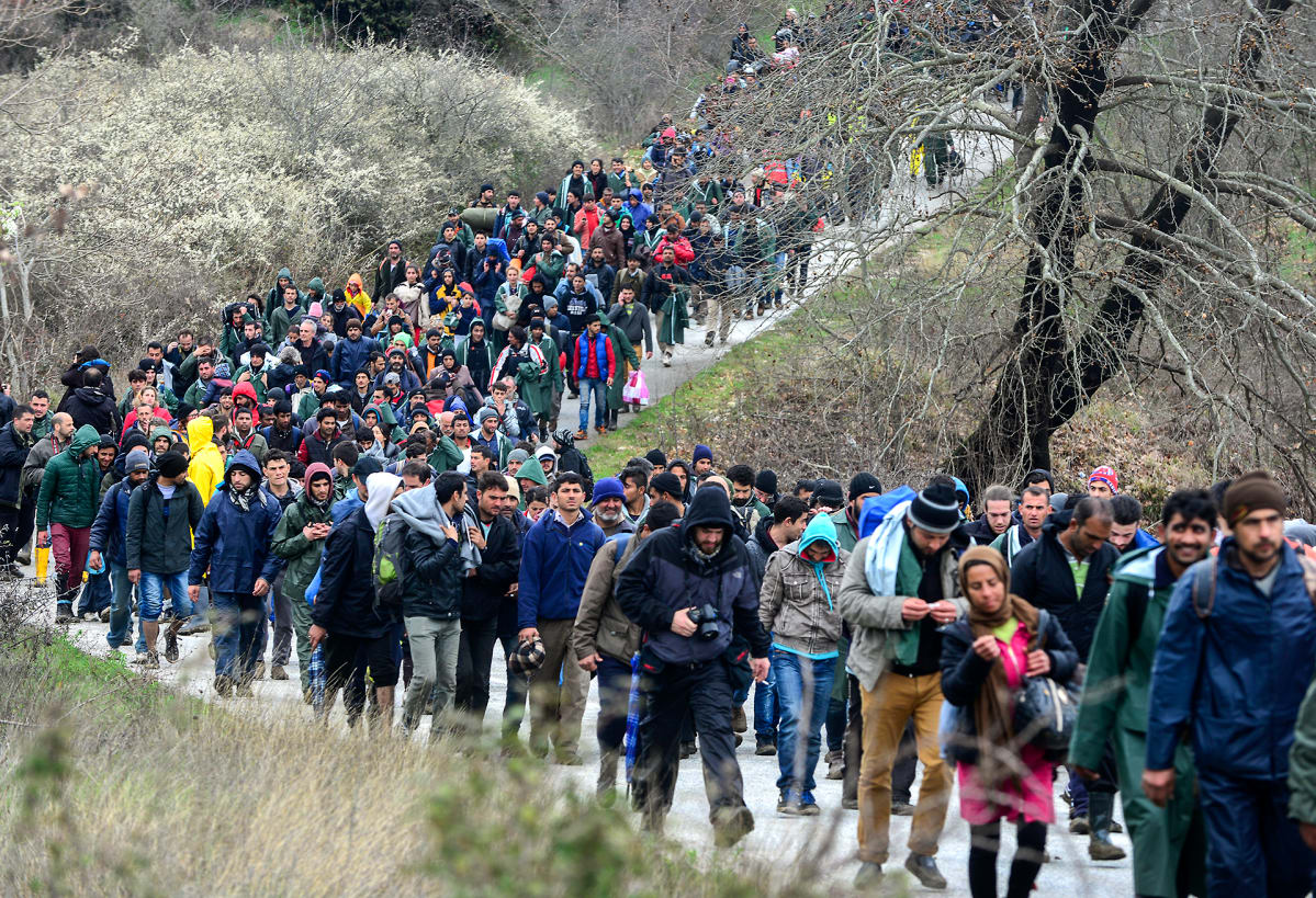 Thousands of refugees wander from the village of Idomen Village in Greece towards the Makedonian border on March 14th.