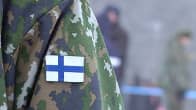 Suomen lippu varusmiehen hihassa. 
