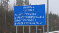 A road sign marks the Nuijamaa border crossing point.
