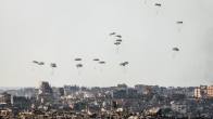 Photo shows relief aid supplies being dropped by parachute into the northern part of Gaza.
