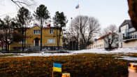 Photo of Russian consulate in Mariehamn, Åland featuring Ukrainian flags in the foreground.