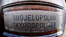 Suojelupoliisin ovi.