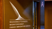 Maahanmuuttoviraston ovi.