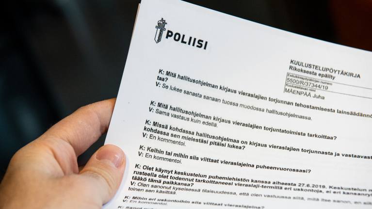 Kuva Poliisin tekemästä Juha Mäenpään kuulustelupöytäkirjasta.