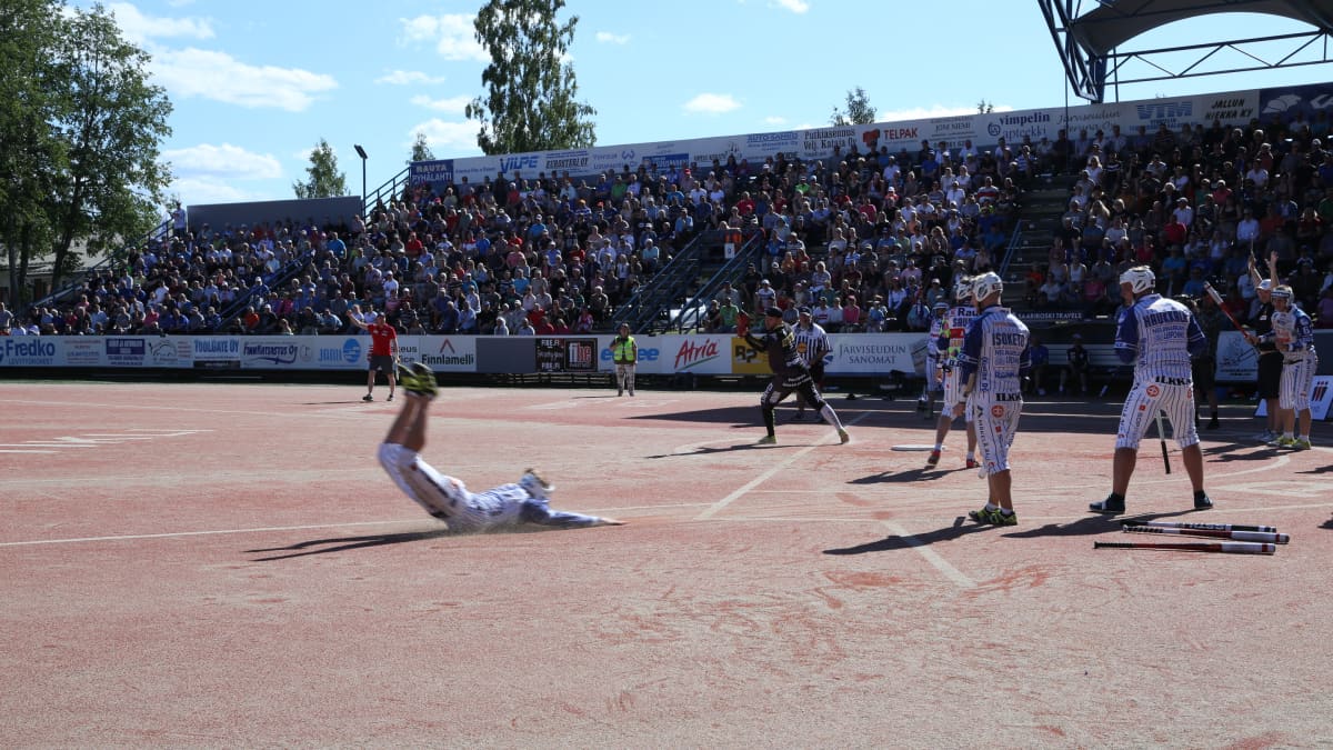 So near yet so far: a Vimpelin Veto player slides for home base but is called ‘out’ as the ball arrived just a fraction of a second before him in his team's home game against Joensuu in June 2018.