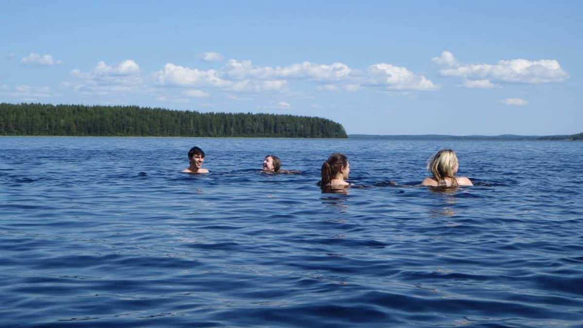 Taking the plunge during Midsummer in Finland.