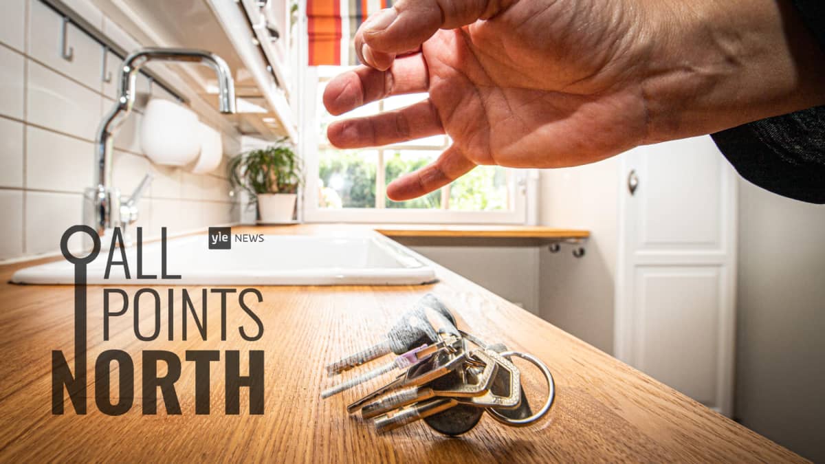 Photo of hand dropping keys on kitchen counter featuring All Points North Podcast logo.