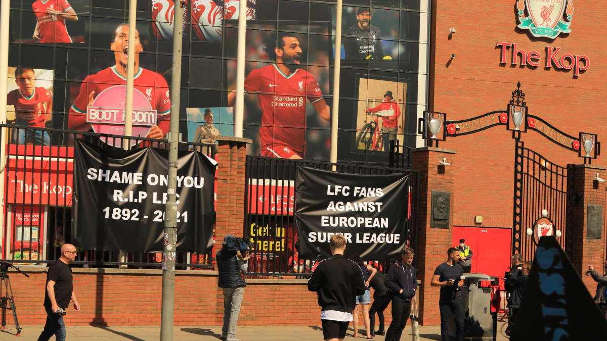 Banners outside Anfield today protesting against Liverpool's owners deciding to join the European Super League. A fan brought his Liverpool shirt and tied it to the grounds railings with the message he wanted the Liverpool owners out. A huge poster a lot higher up summed the fans opinion of the move to the European Super League