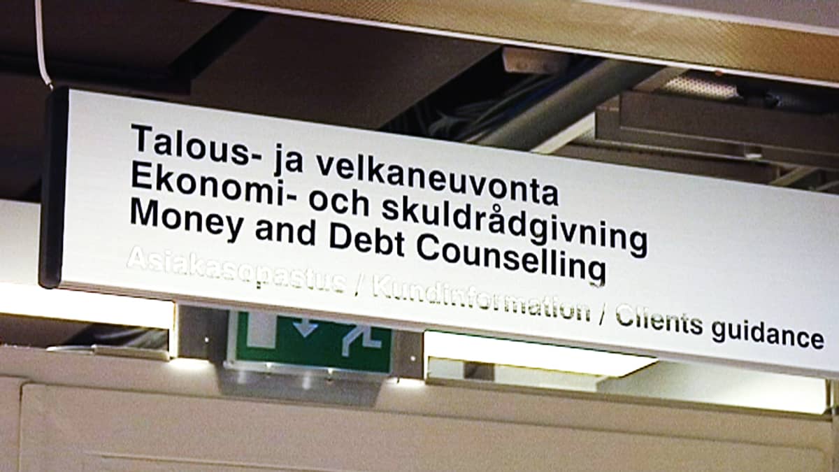 Talous- ja velkaneuvonta -kyltti velkaneuvojan toimistossa.