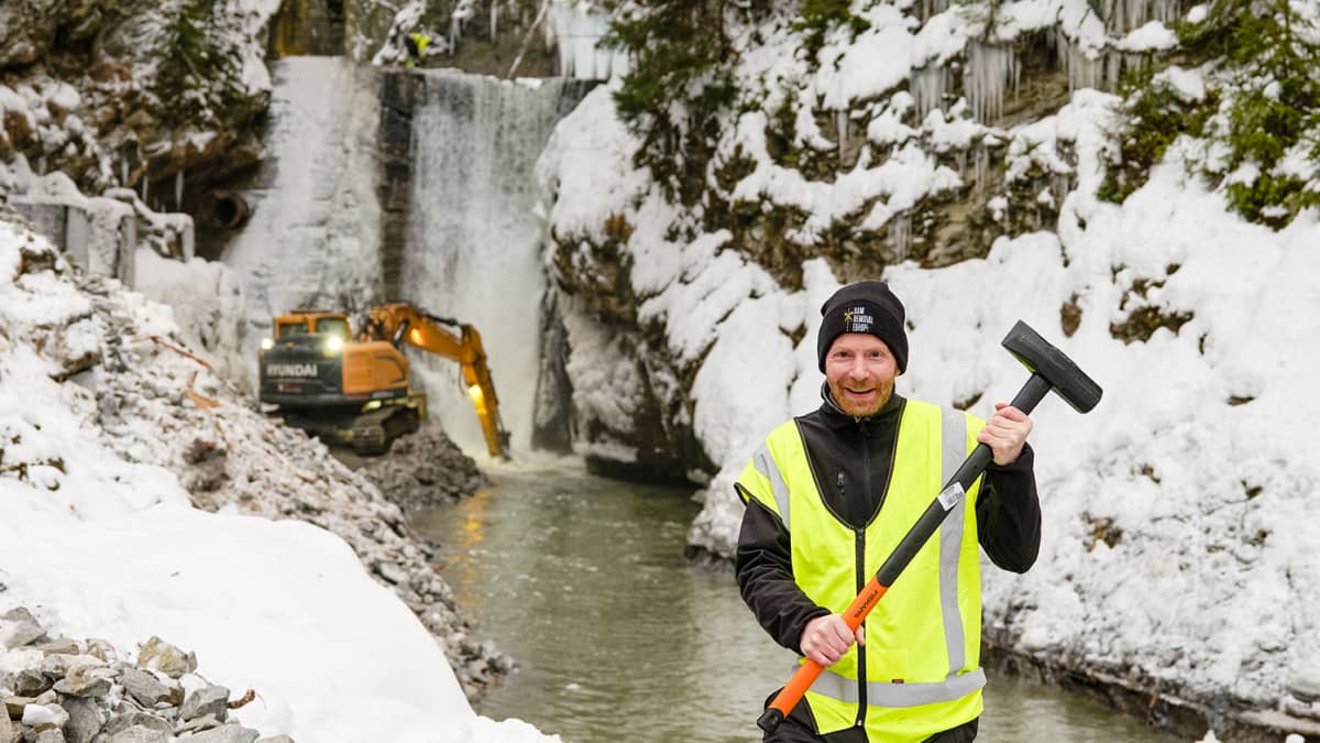 Dam removal in Tromso river (Norway). Local fisherman Tore Solbakken prepared this dam removal project during 5 years. This old hydropower dam was not used anymore. In January 2022 this dam was removed by using explosives.